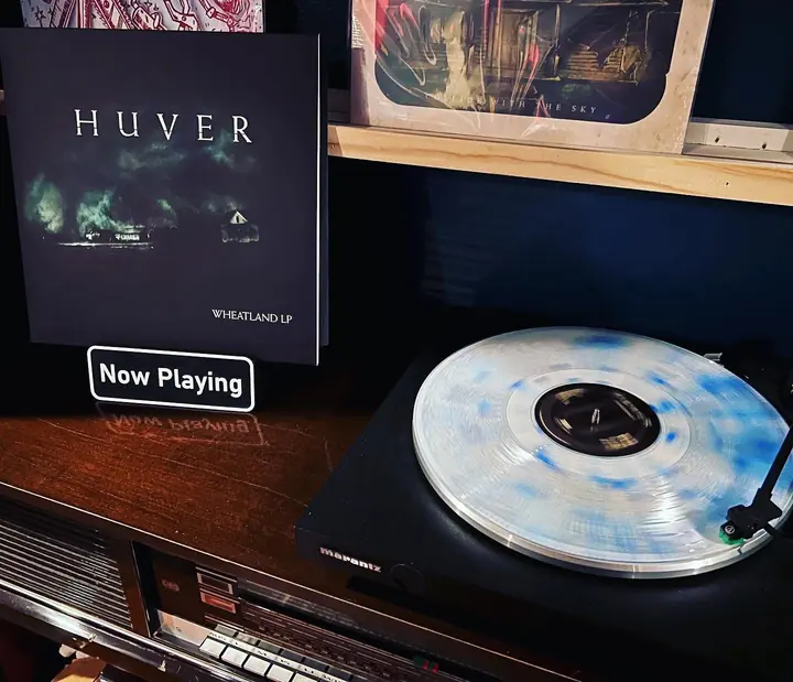 Vintage vinyl record playing on a turntable